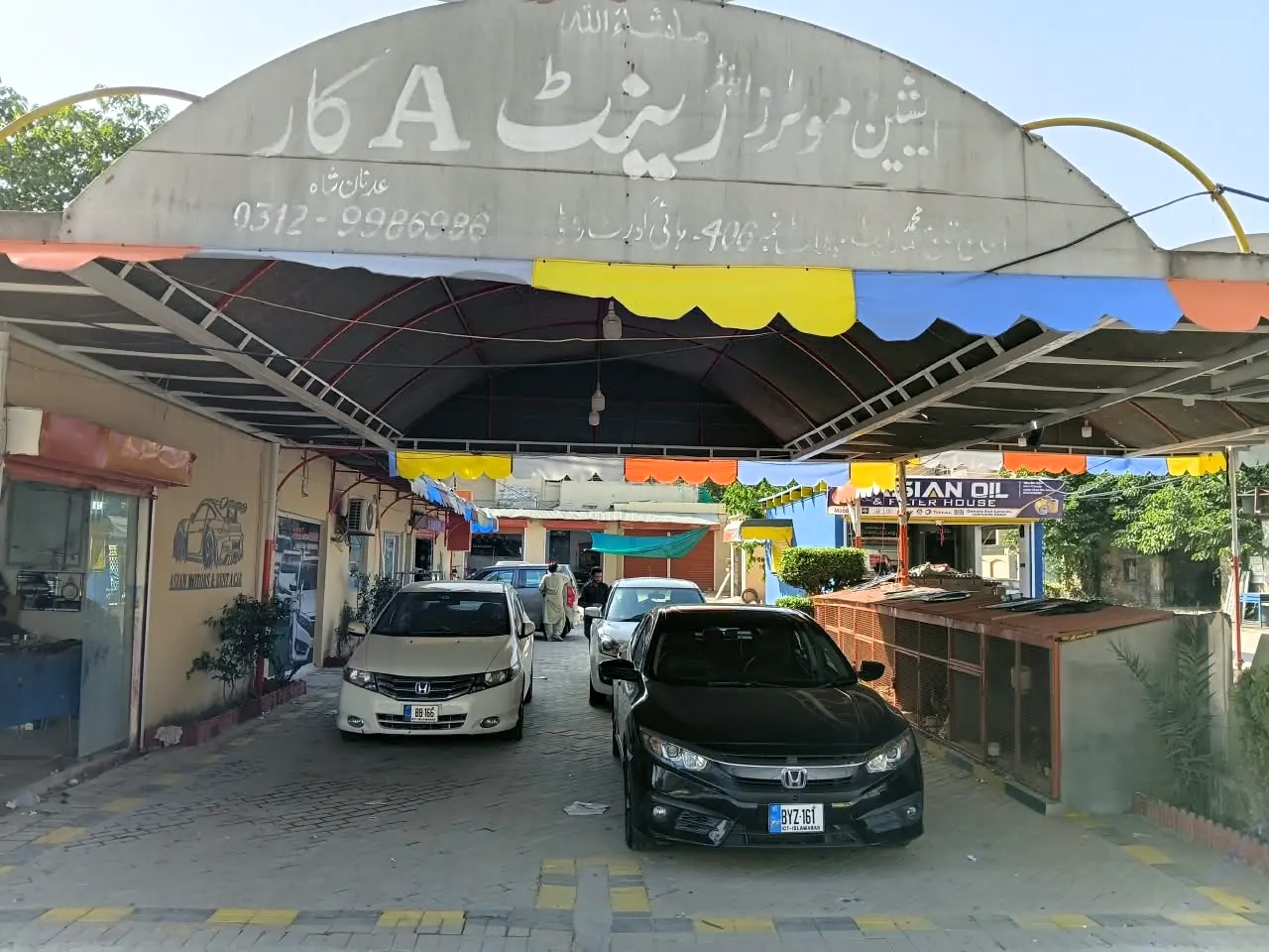 The Asian Motors and Rent A Car entrance on High Court Road